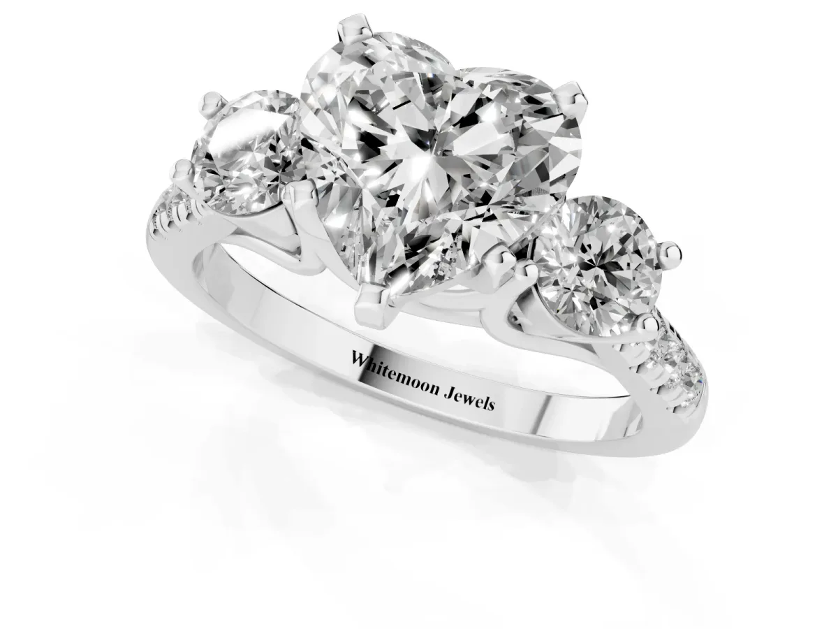 Three-Stone Heart Cut Diamond Pavé Band with Four-Prong Setting Platinum