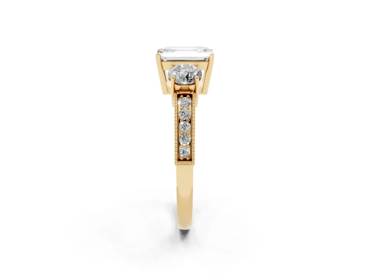 Emerald Cut Three-Stone Diamond Ring with Pavé Band and Four-Prong Setting Yellow gold