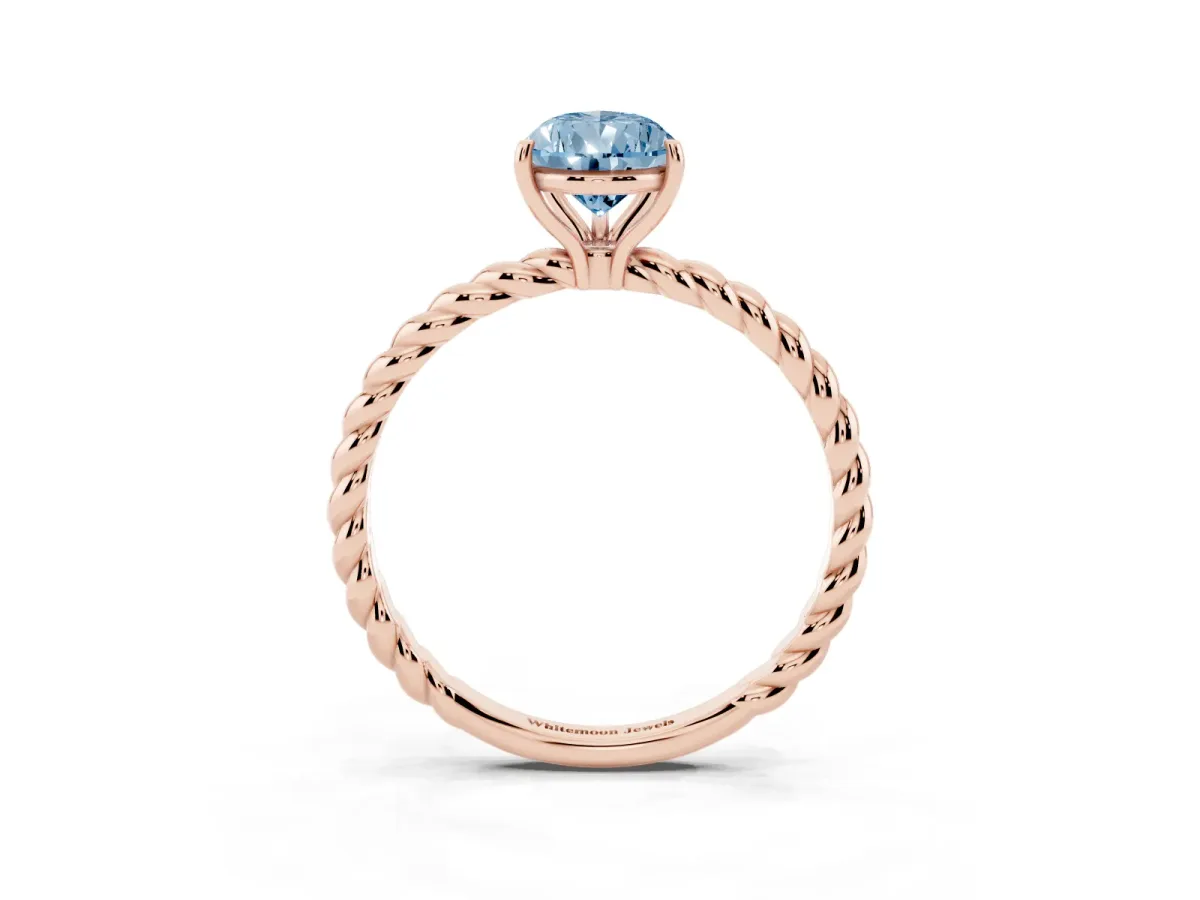 Fancy Blue Pear Cut Solitaire Twist Band Ring with Four-Prong Setting Rose gold