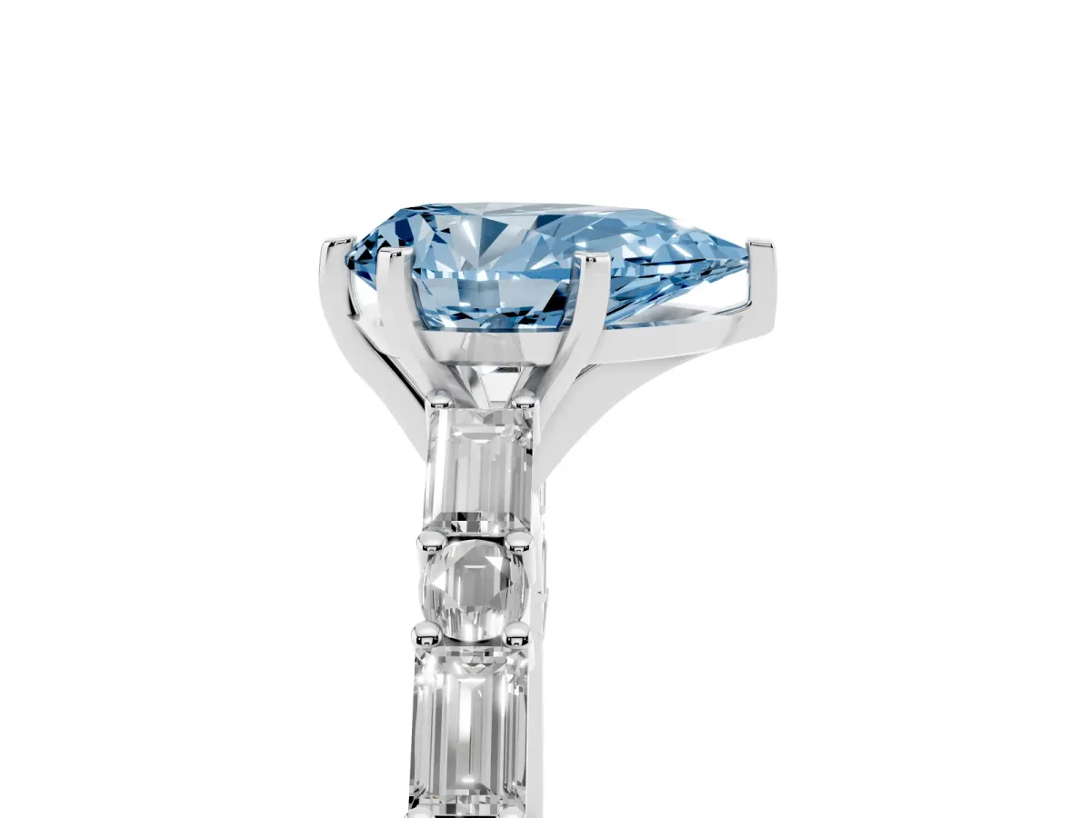Fancy Blue Pear Cut Diamond Solitaire with Side Baguettes and Channel Set Band Silver
