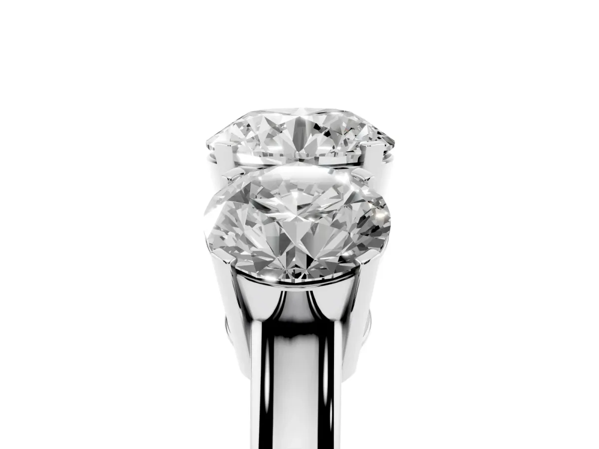 Three-Stone Round Cut Cut Diamond Ring with Channel Set Band and Four-Prong Setting Platinum