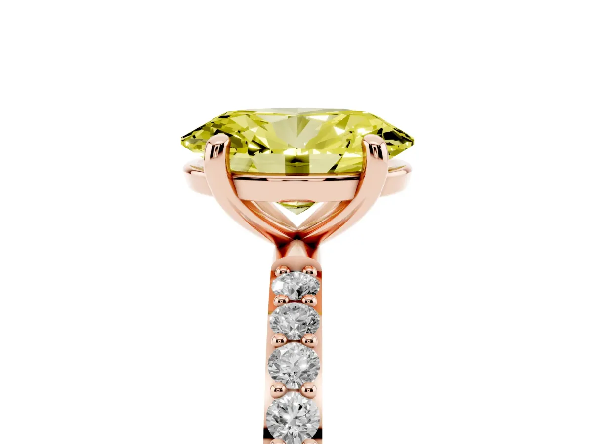 Fancy Yellow Oval Cut Diamond Solitaire Ring with Round Pavé Band and Prong Setting Rose gold