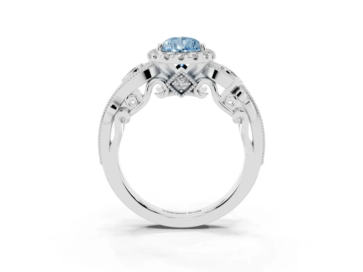 Fancy Blue Pear Cut Halo Diamond Ring with Milgrain and Bezel Accents on a Split Shank Band White gold
