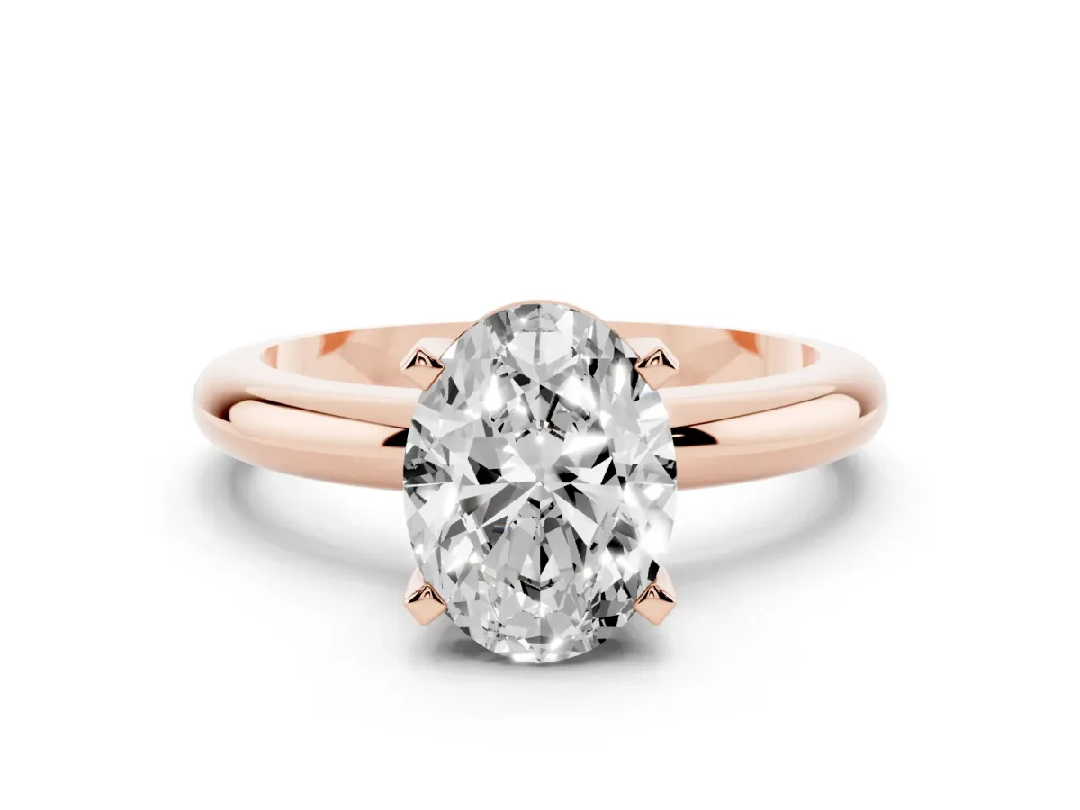Oval Cut Diamond Solitaire Engagement Ring with Round Band and Four-Prong Setting Rose gold