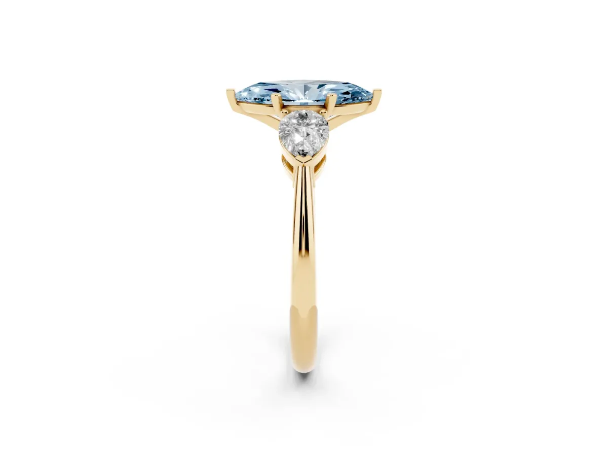 Fancy Blue Three-Stone Marquise Cut Diamond Ring with Pear Side Stones and Four-Prong Setting Yellow gold