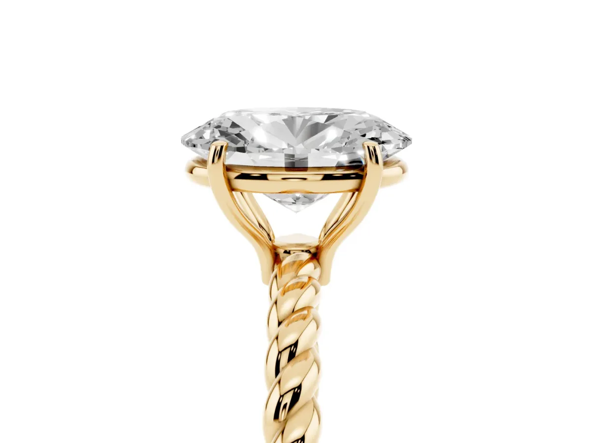 Oval Cut Solitaire Twist Band Ring with Four-Prong Setting Yellow gold