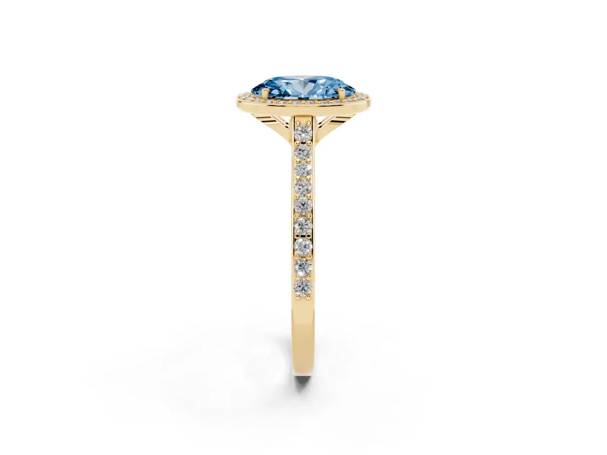 Fancy Blue Oval Cut Diamond Halo Engagement Ring with Round Pavé Shoulders and Prong Setting Yellow gold