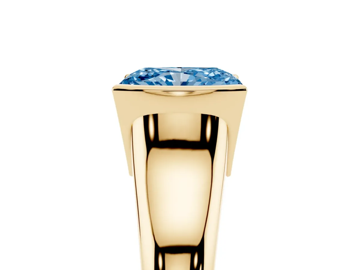 Fancy Blue Radiant Cut Solitaire Tension Set Diamond Ring with Split Shank Band Yellow gold