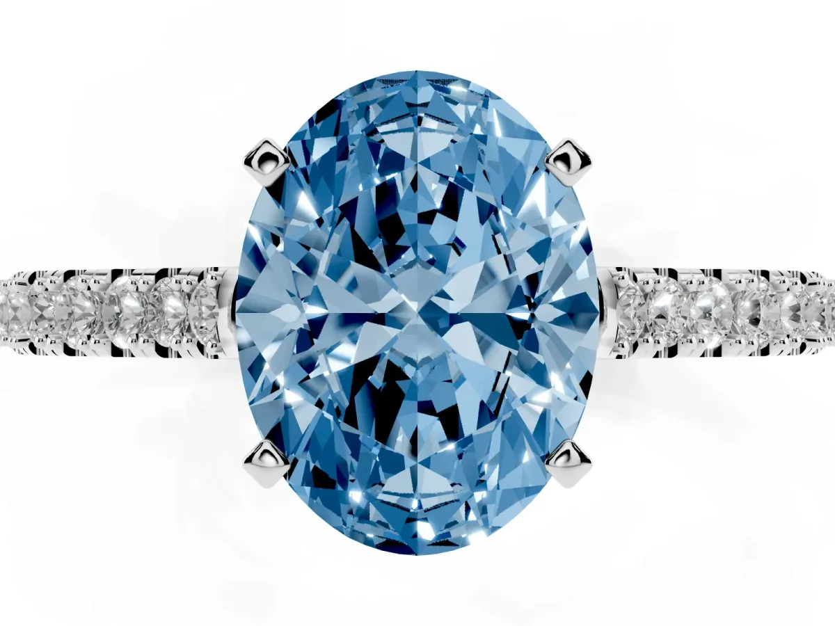 Fancy Blue Oval Cut Cut Solitaire Diamond Engagement Ring with Pave Band and Four-Prong Setting Platinum