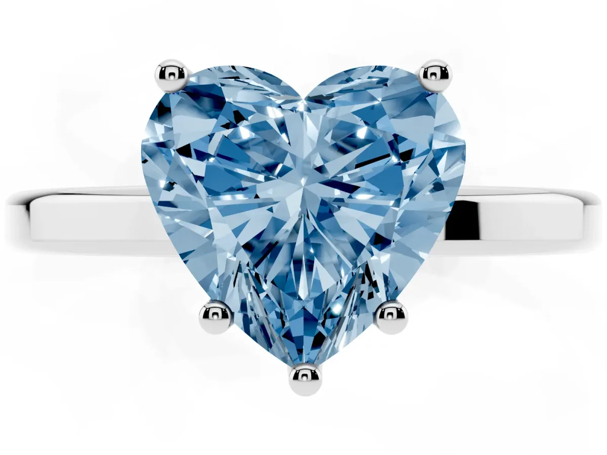 Fancy Blue Heart Cut Cut Solitaire Engagement Ring with Four-Prong Setting on a Classic Band Silver