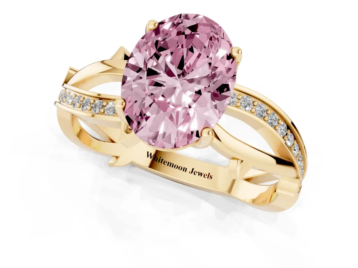 Fancy Pink Oval Cut Solitaire Twist Band with Pavé Accents and Four-Prong Setting Yellow gold