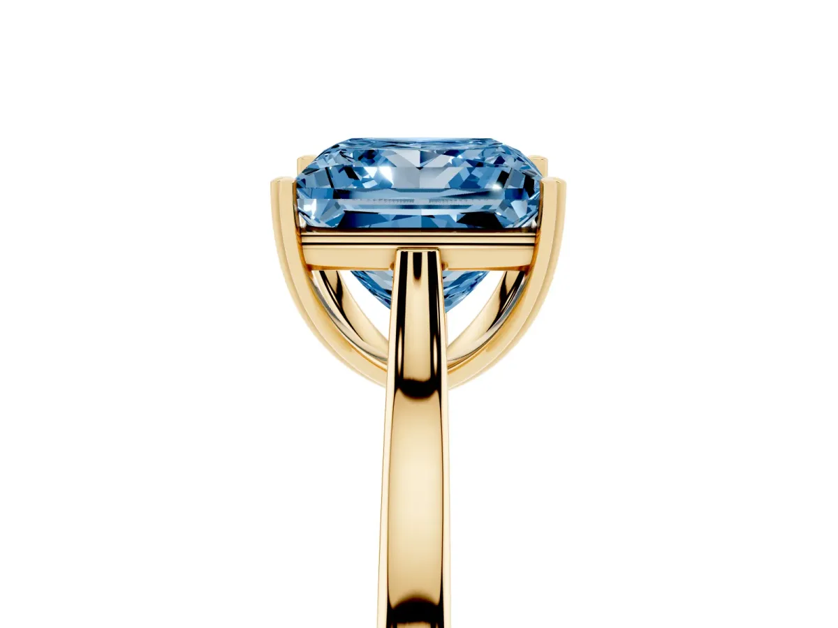 Fancy Blue Princess Cut Solitaire Heart Prong Engagement Ring with Tapered Band Yellow gold