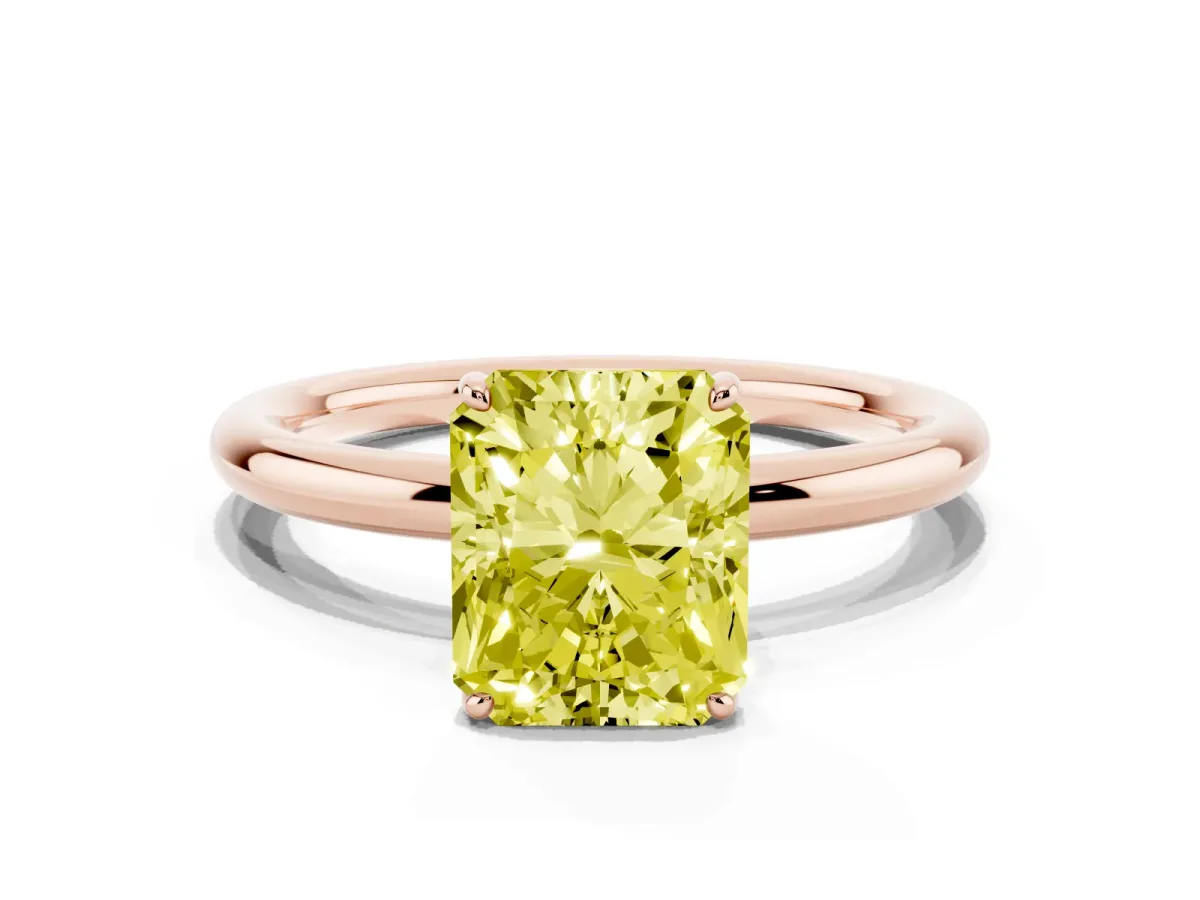 Fancy Yellow Radiant Cut Solitaire Diamond Ring with Four-Prong Setting on a Plain Band Rose gold