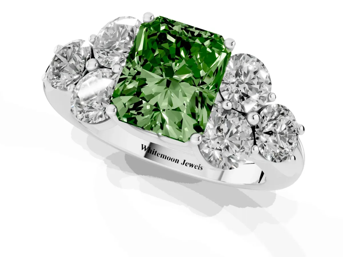 Fancy Green Radiant Cut Cut Diamond Cluster Ring with Round Accent Stones and Prong Setting on a Classic Band Silver