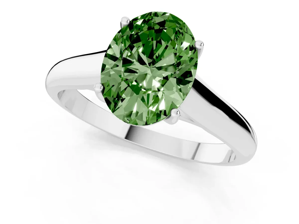 Fancy Green Oval Cut Solitaire Engagement Ring with Tapered Band and Four-Prong Setting Silver