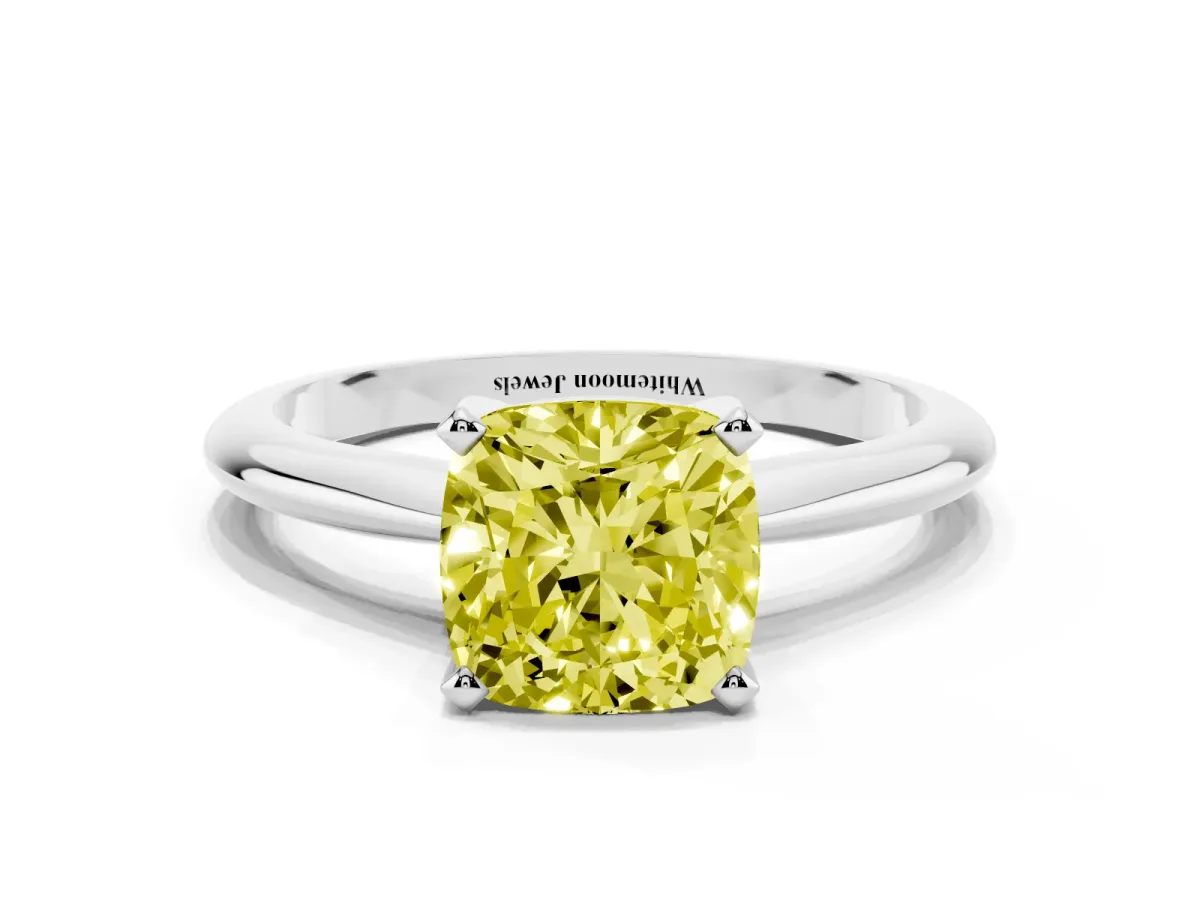 Fancy Yellow Cushion Cut Cut Solitaire Ring with Four-Prong Setting on a Classic Band Silver