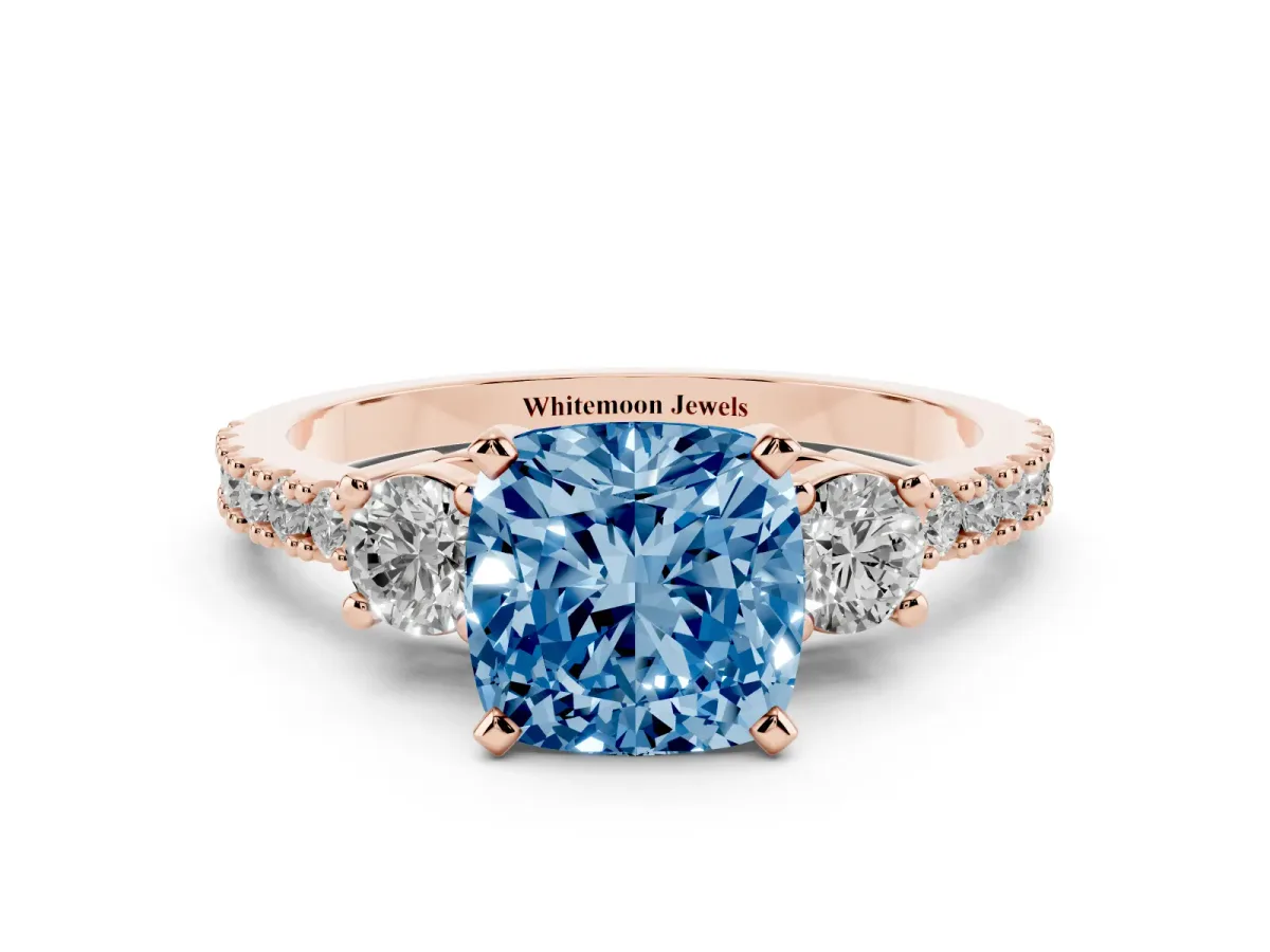 Fancy Blue Cushion Cut Three-Stone Diamond Pavé Band with Prong Setting Rose gold