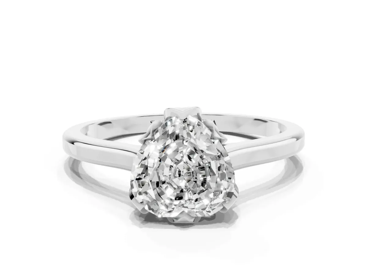 Heart Cut Diamond Solitaire Ring with Flower Prong Setting and Classic Band Silver