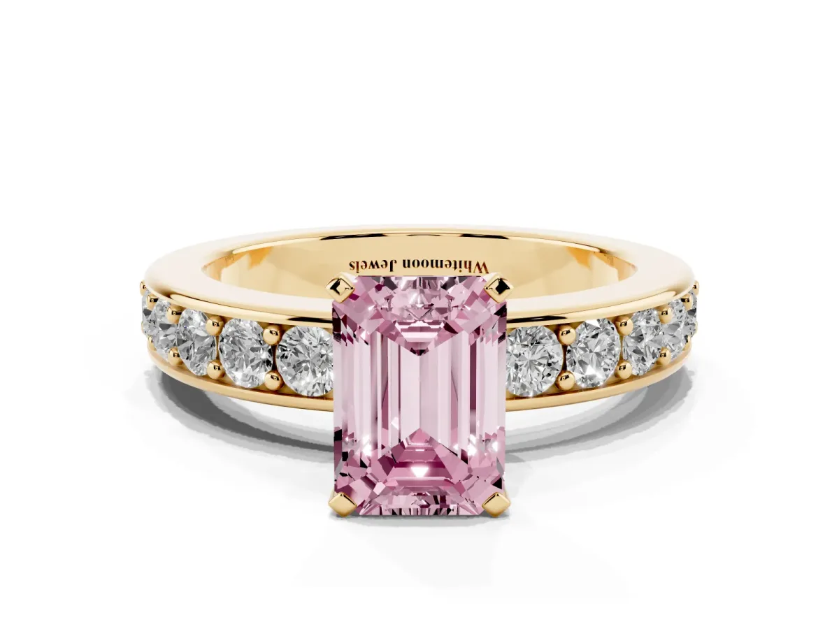 Fancy Pink Emerald Cut Diamond Engagement Ring with Channel Set Round Band and Prong Setting Yellow gold