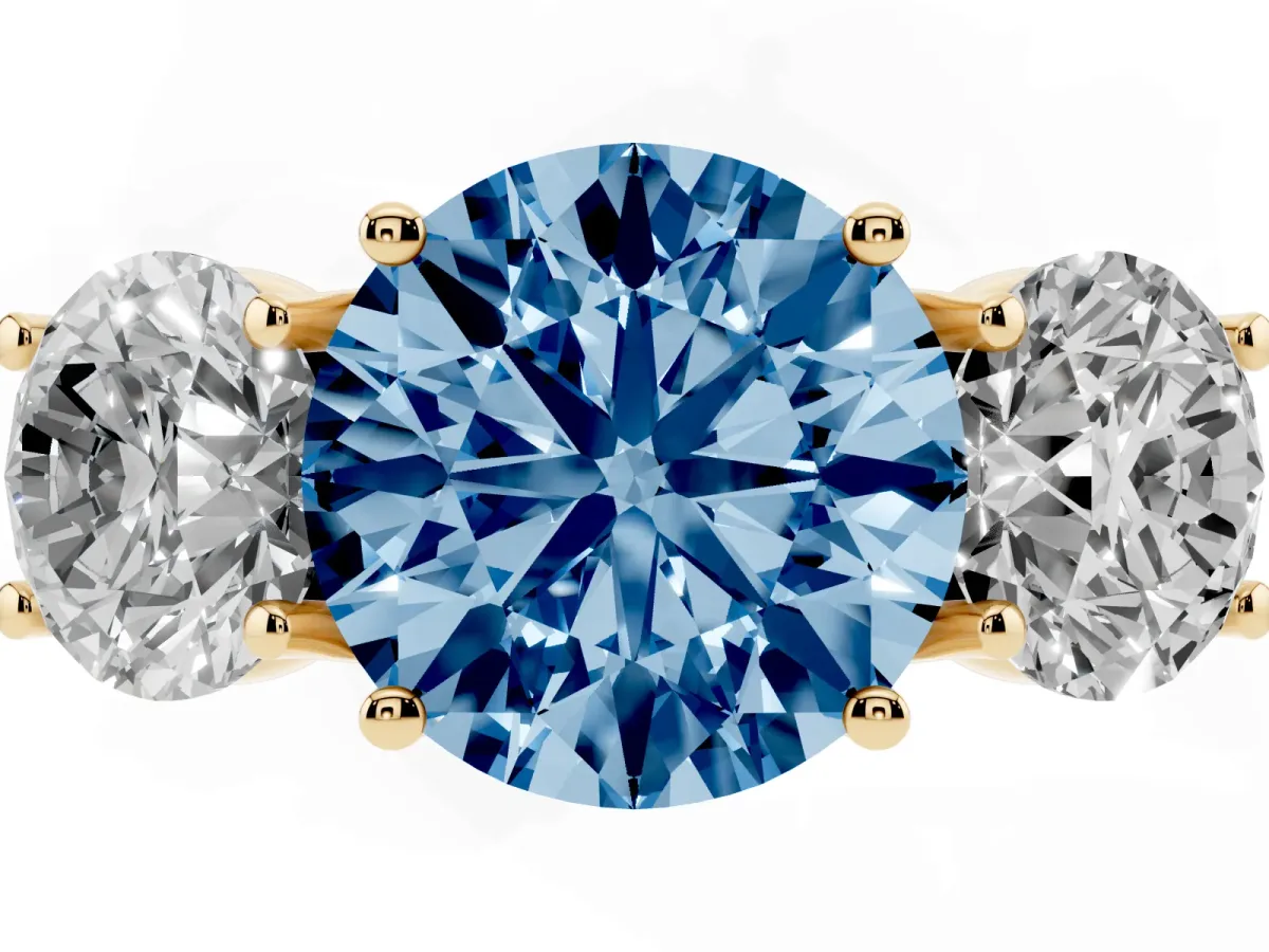 Fancy Blue Three-Stone Round Cut Diamond Engagement Ring with Prong Setting Yellow gold