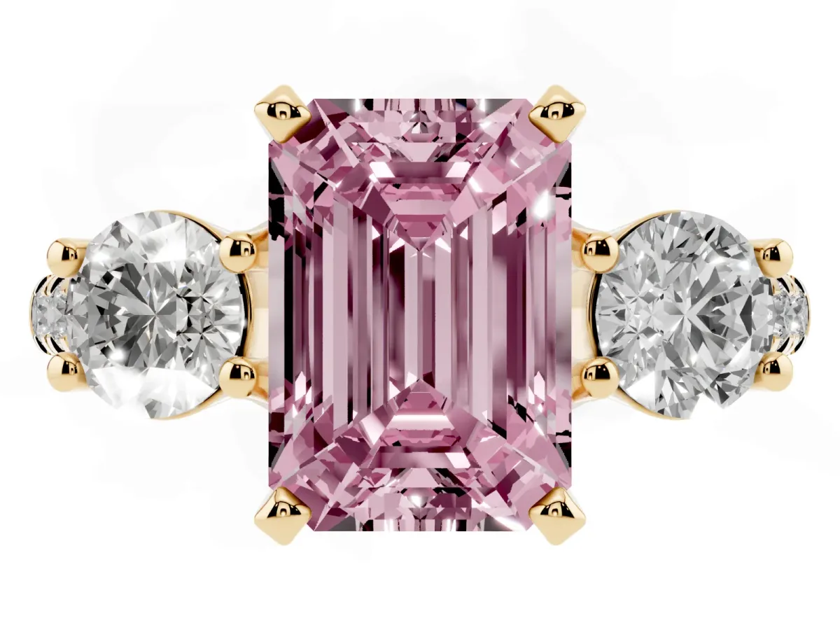 Fancy Pink Three-Stone Emerald Cut Diamond Pavé Band with Four-Prong Setting Yellow gold