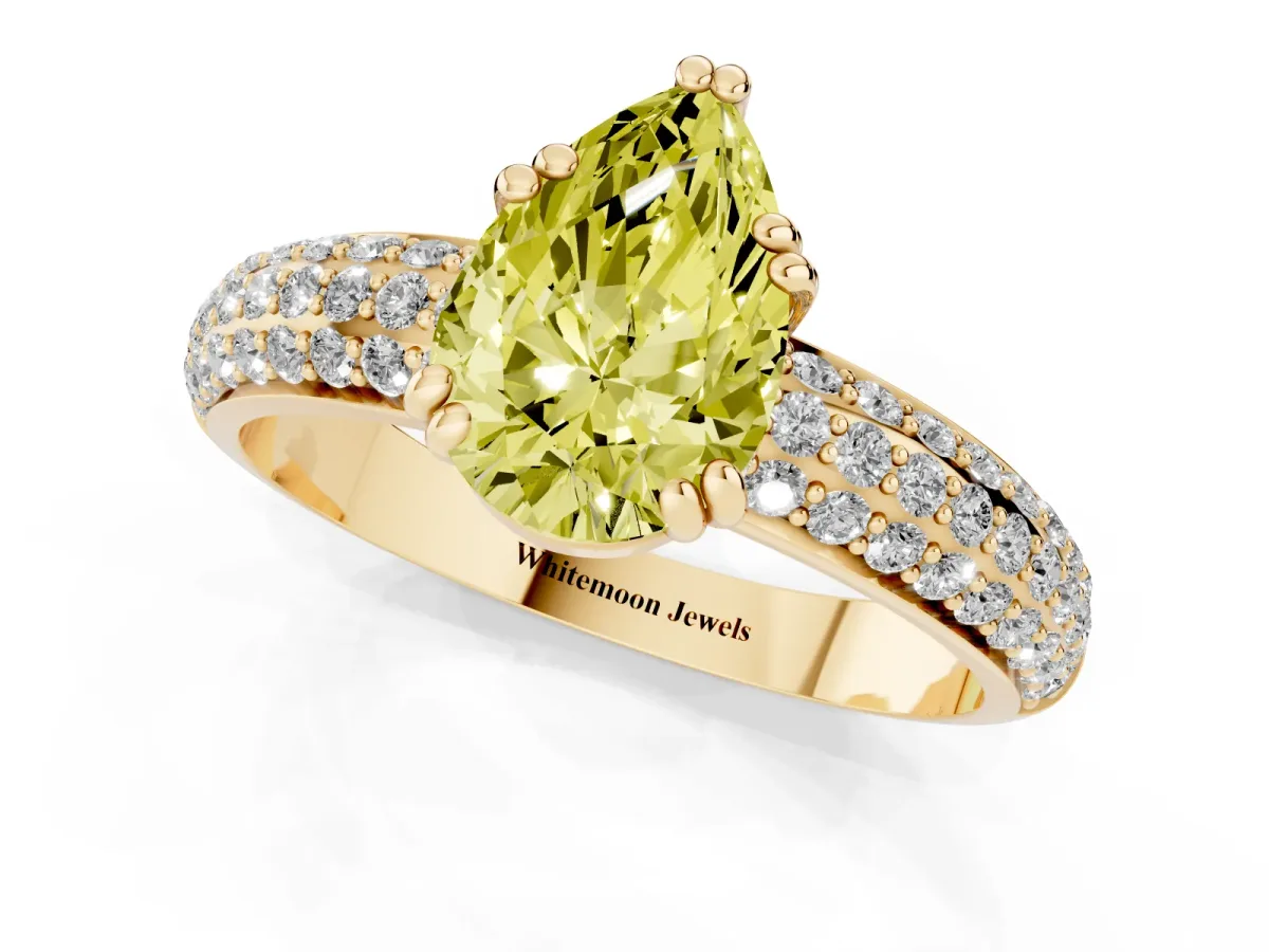 Fancy Yellow Pear Cut Diamond Solitaire Ring with Multi-Row Round Pavé Band and Prong Setting Yellow gold