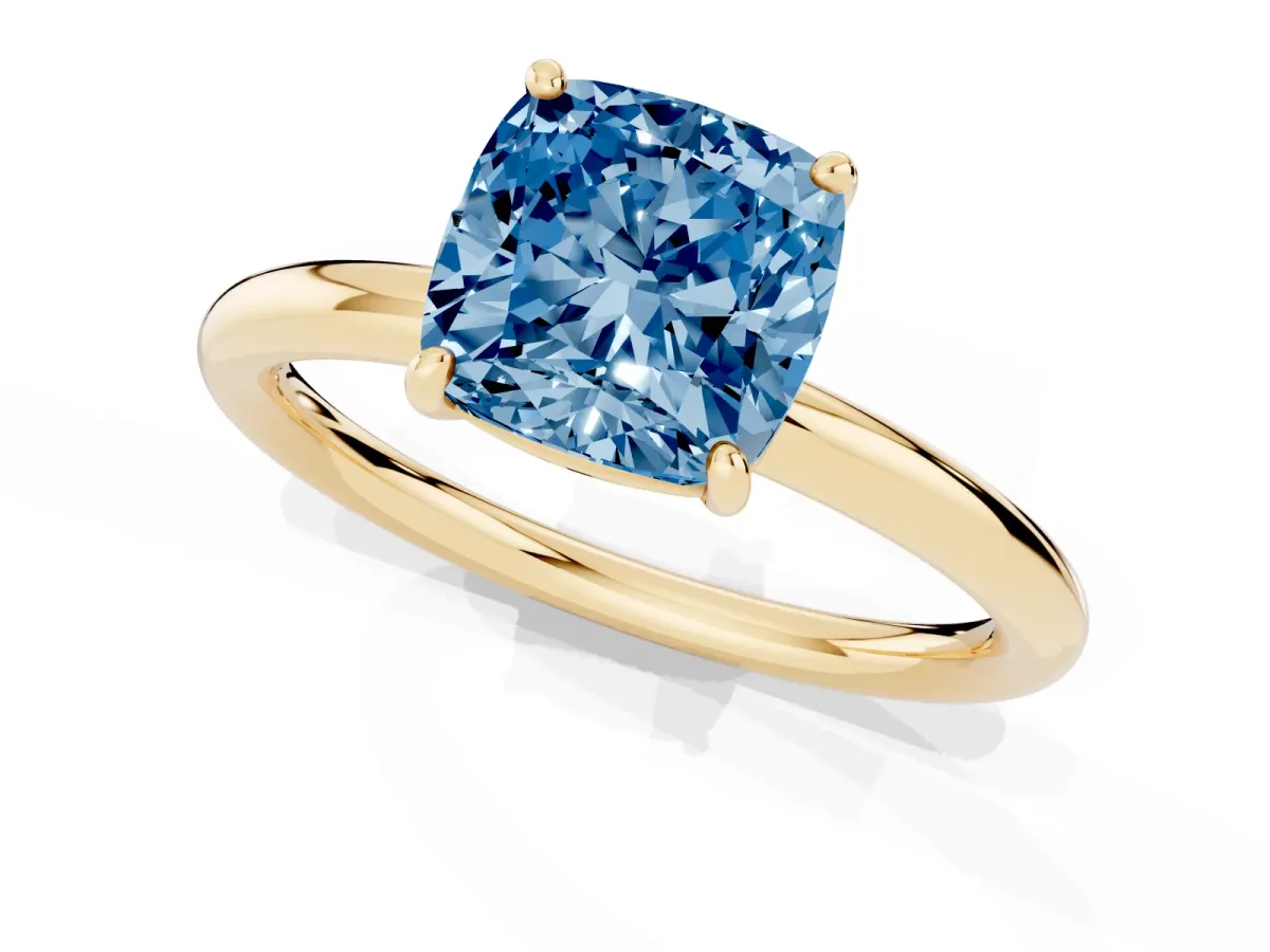 Fancy Blue Cushion Cut Solitaire Diamond Ring with Four-Prong Setting on a Plain Band Yellow gold