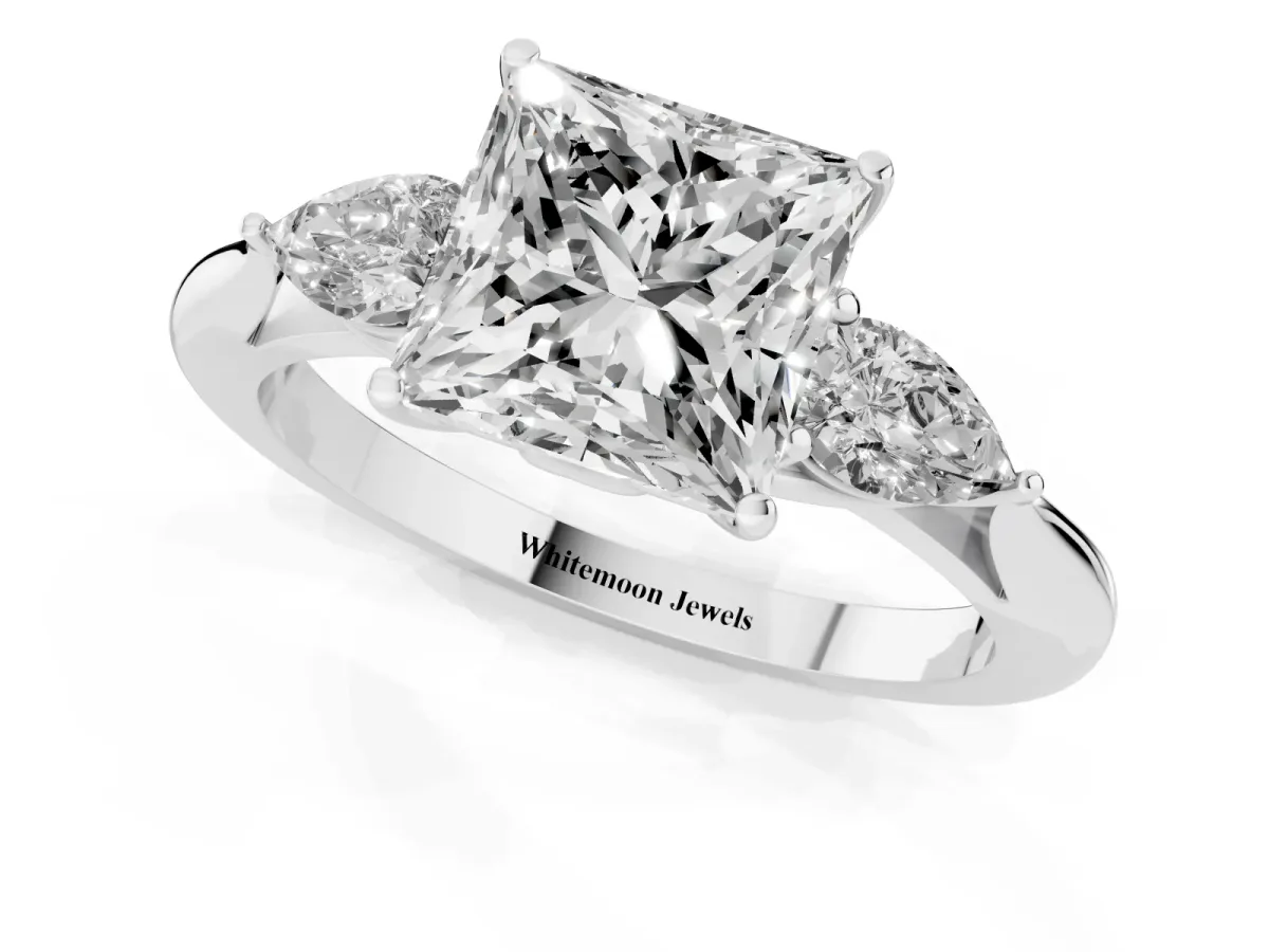 Princess Cut Diamond Three-Stone Ring with Pear Side Stones and Prong Setting Platinum
