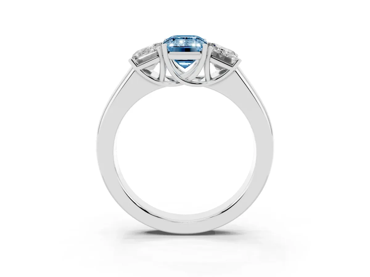 Fancy Blue Three-Stone Emerald Cut Cut Diamond Ring with Prong Setting and Classic Band Silver