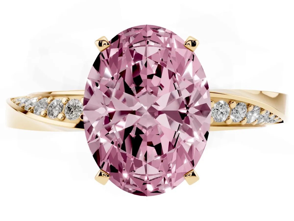 Fancy Pink Oval Cut Diamond Engagement Ring with Side Stone Accents and Four-Prong Setting Yellow gold