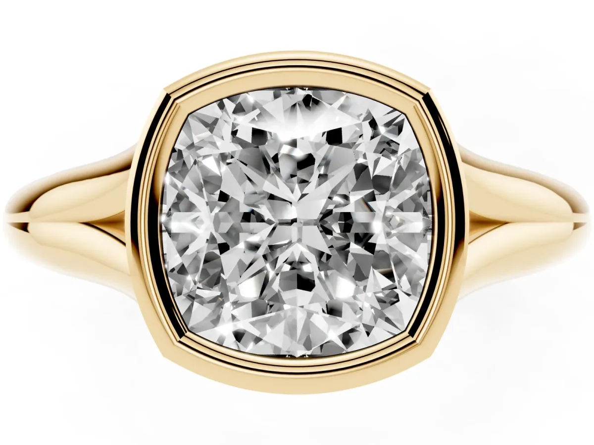 Bezel Set Cushion Cut Solitaire Diamond Ring with Smooth Band Yellow gold