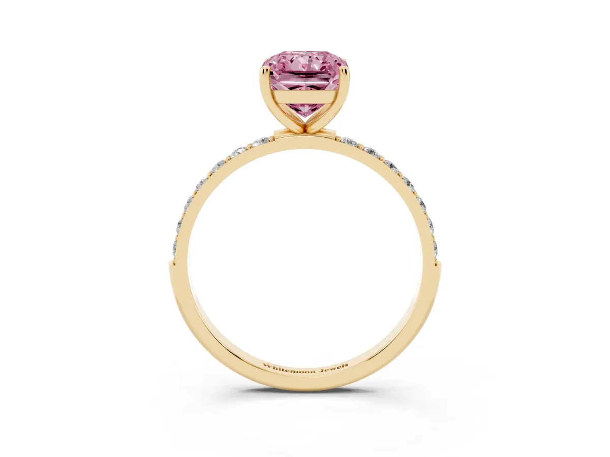 Fancy Pink Radiant Cut Diamond Solitaire Ring with Round Pavé Shoulders and Prong Setting Yellow gold