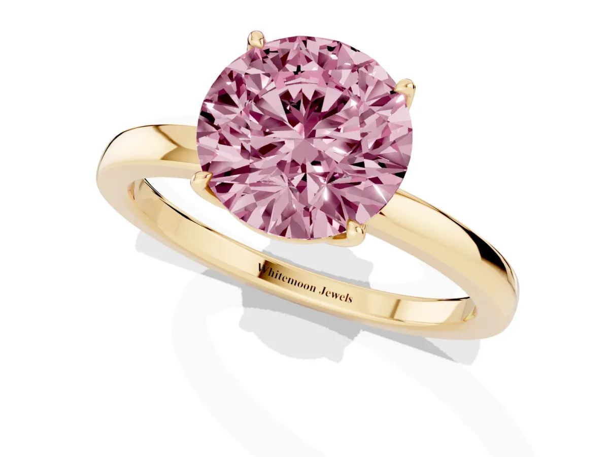Fancy Pink Round Cut Diamond Solitaire Ring with Thin Band and Prong Setting Yellow gold