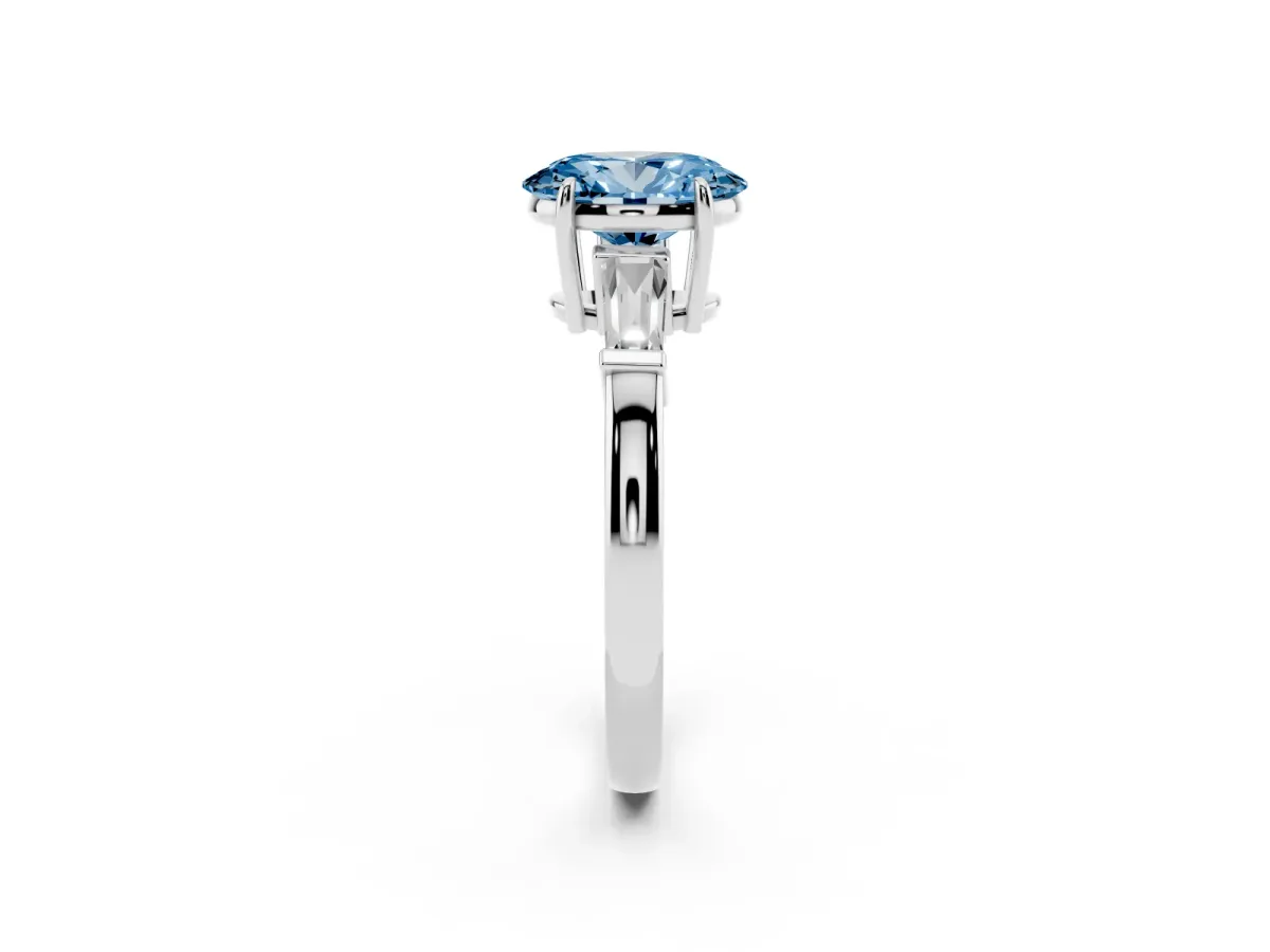 Fancy Blue Oval Cut Diamond Three-Stone Ring with Tapered Baguette Side Stones and Prong Setting Silver