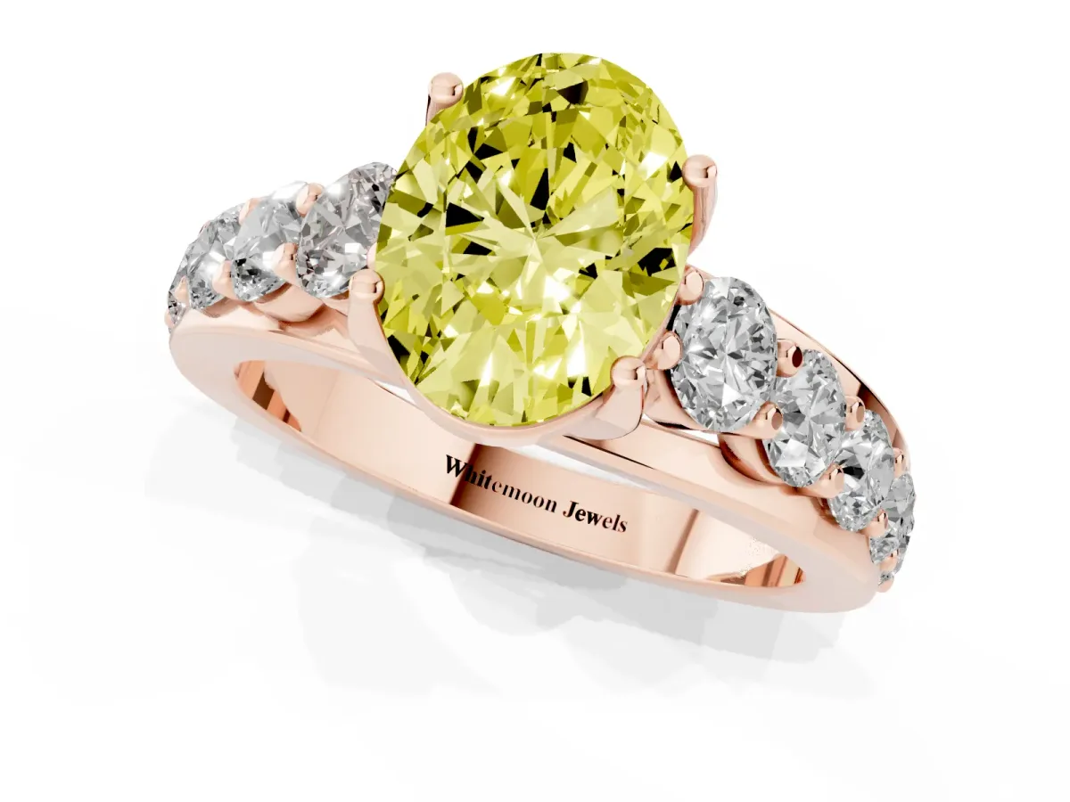 Fancy Yellow Oval Cut Diamond Engagement Ring with Pavé Band and Four-Prong Setting Rose gold