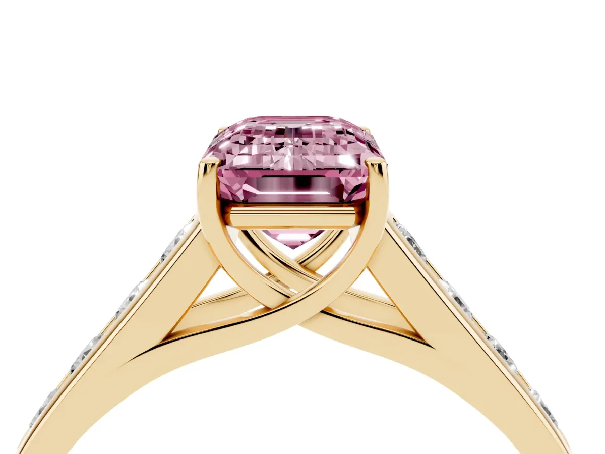 Fancy Pink Emerald Cut Brilliant Channel-Set Solitaire Ring with Four-Prong Setting Yellow gold