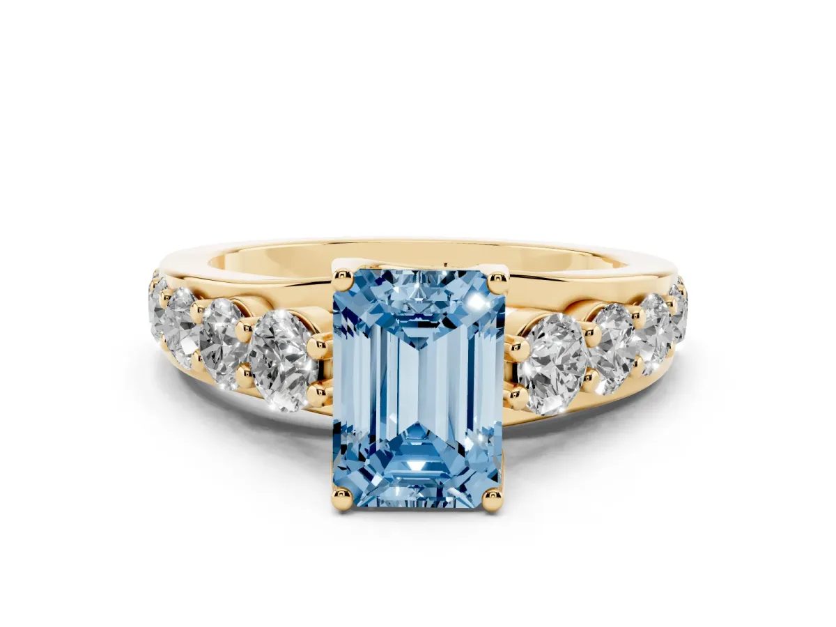 Fancy Blue Emerald Cut Diamond Engagement Ring with Pavé Band and Four-Prong Setting Yellow gold