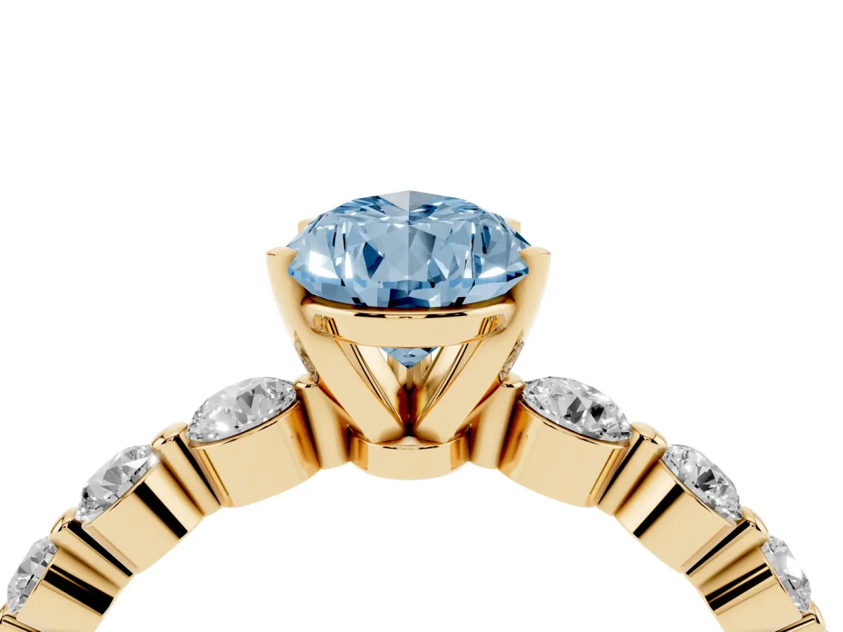 Fancy Blue Pear Cut Solitaire Diamond Ring with Pave Band and Four-Prong Setting Yellow gold