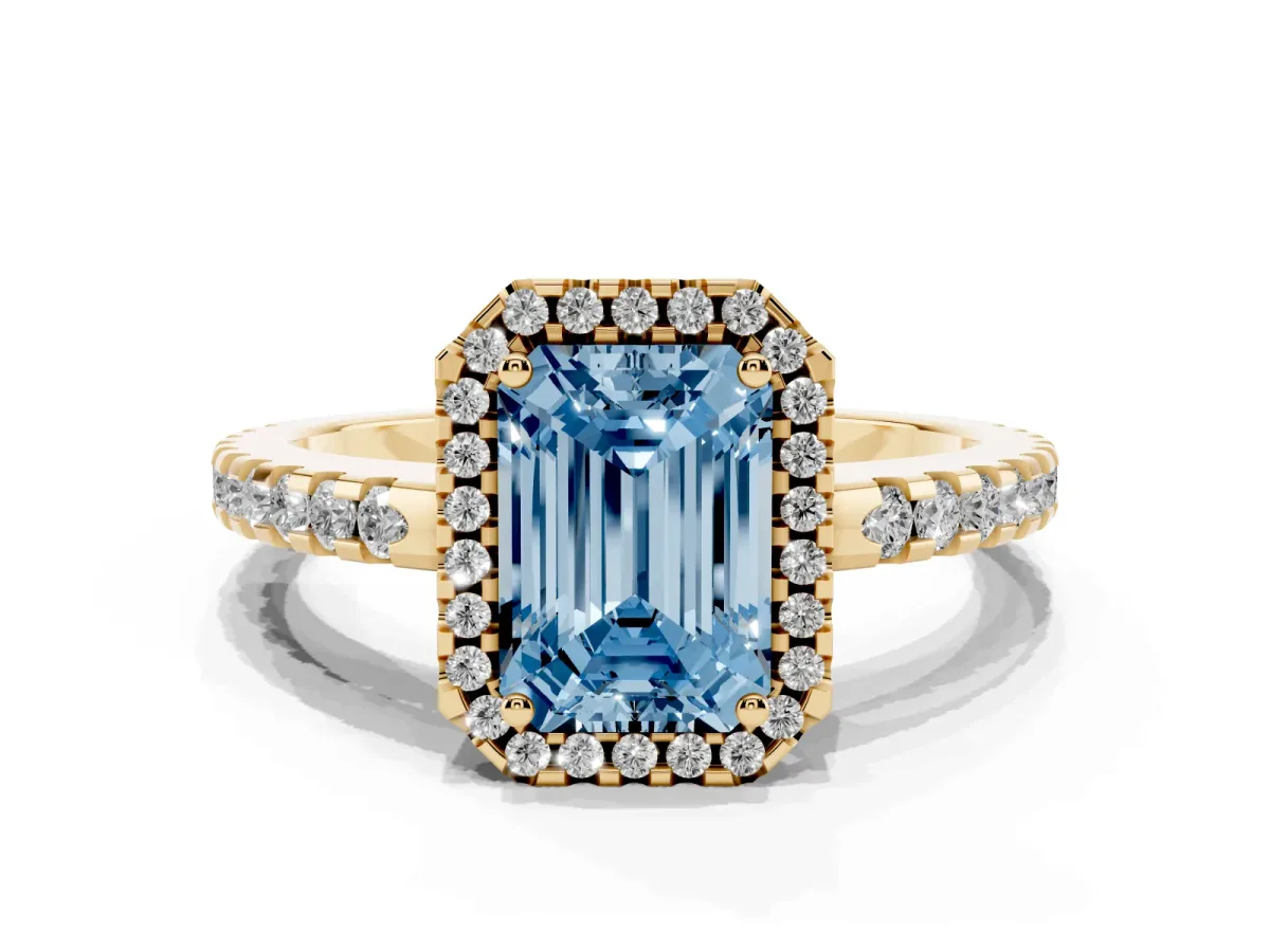 Fancy Blue Emerald Cut Diamond Halo Engagement Ring with Pavé Band and Prong Setting Yellow gold