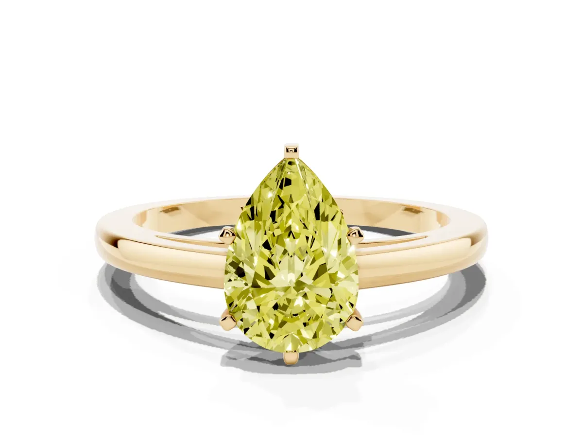 Fancy Yellow Pear Cut Solitaire Diamond Engagement Ring with Four-Prong Setting on a Classic Band Yellow gold