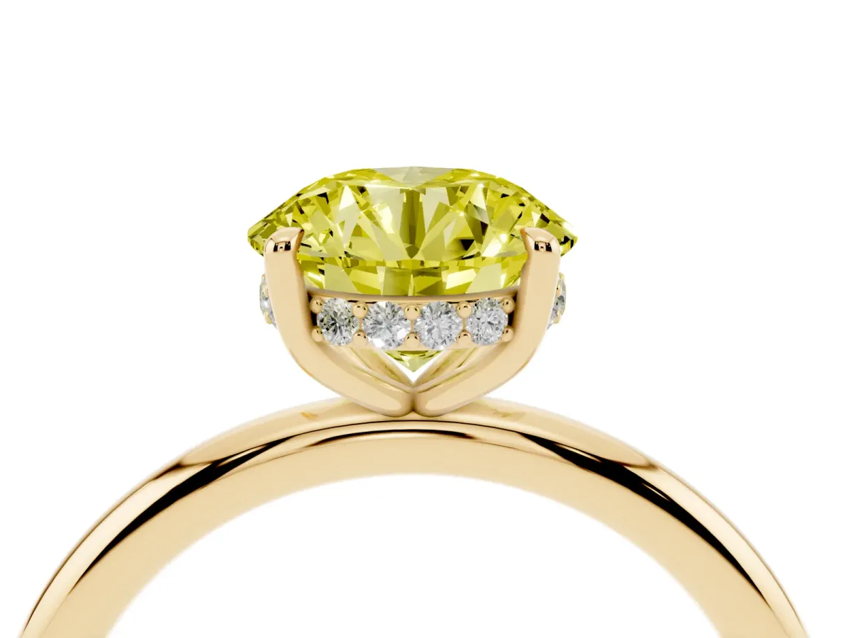 Fancy Yellow Round Cut Diamond Solitaire Ring with Thin Band and Four-Prong Setting Yellow gold