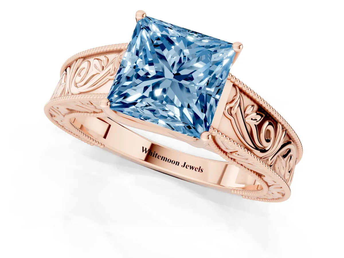 Fancy Blue Princess Cut Diamond Solitaire Ring with Engraved Band and Four-Prong Setting Rose gold