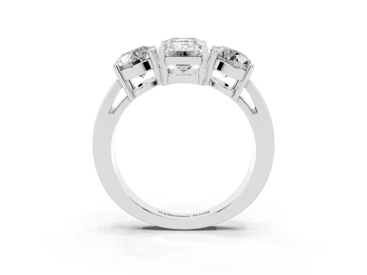 Three-Stone Emerald Cut Diamond Ring with Round Side Stones, Classic Band, and Four-Prong Setting Silver
