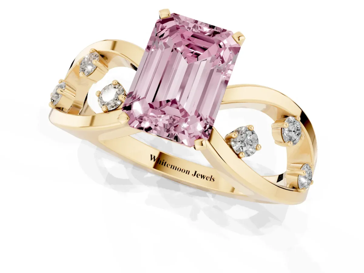 Fancy Pink Emerald Cut Cut Solitaire Diamond with Side Stones on Criss-Cross Band and Four-Prong Setting Yellow gold