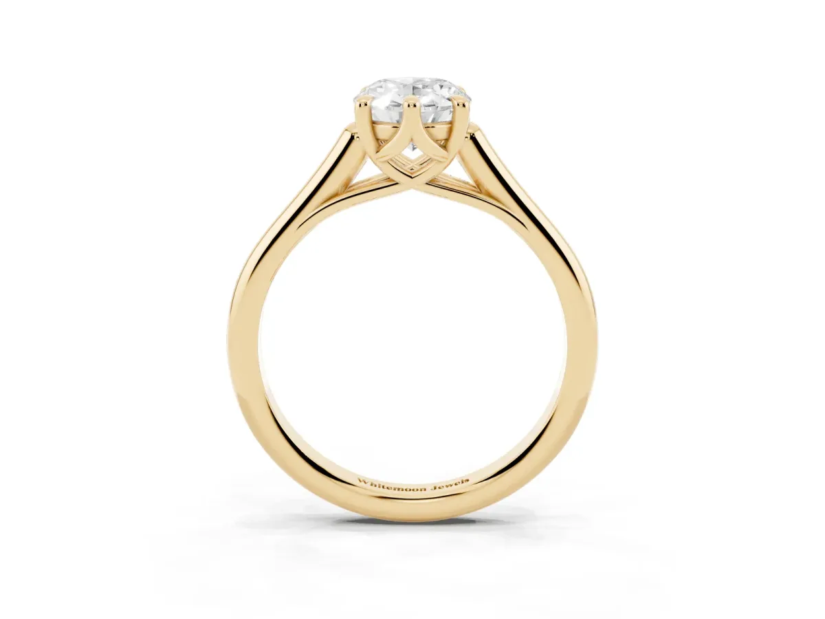 Oval Cut Solitaire Engagement Ring with Six-Prong Setting and Classic Band Yellow gold
