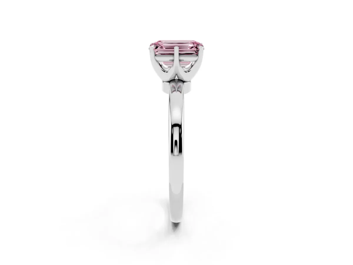 Fancy Pink Emerald Cut Solitaire Diamond Ring with Six-Prong Setting on a Classic Band Platinum