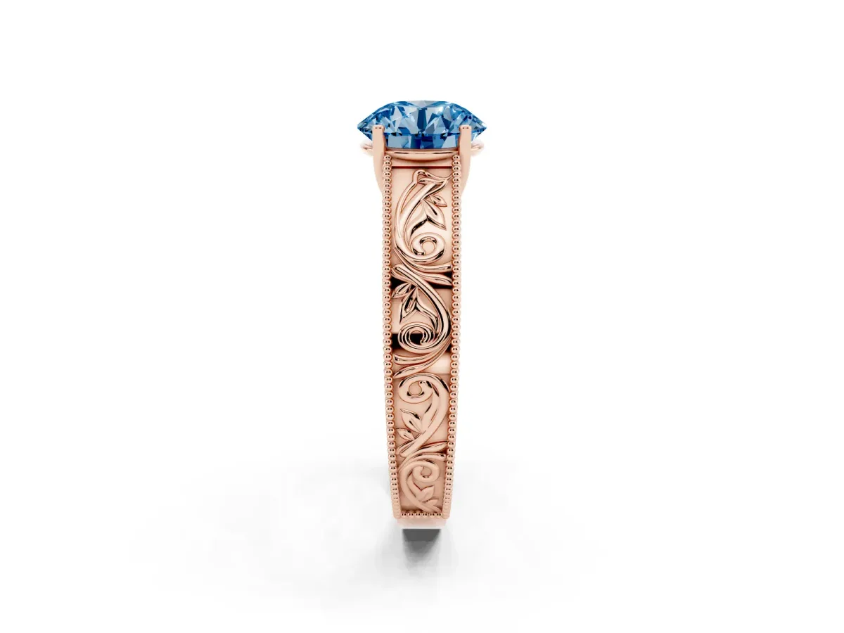 Fancy Blue Round Cut Diamond Solitaire Ring with Engraved Band and Four-Prong Setting Rose gold
