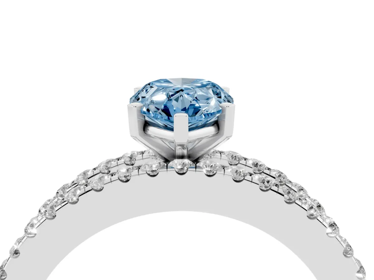 Fancy Blue Pear Cut Diamond Solitaire Ring with Pavé and Channel Set Band Silver