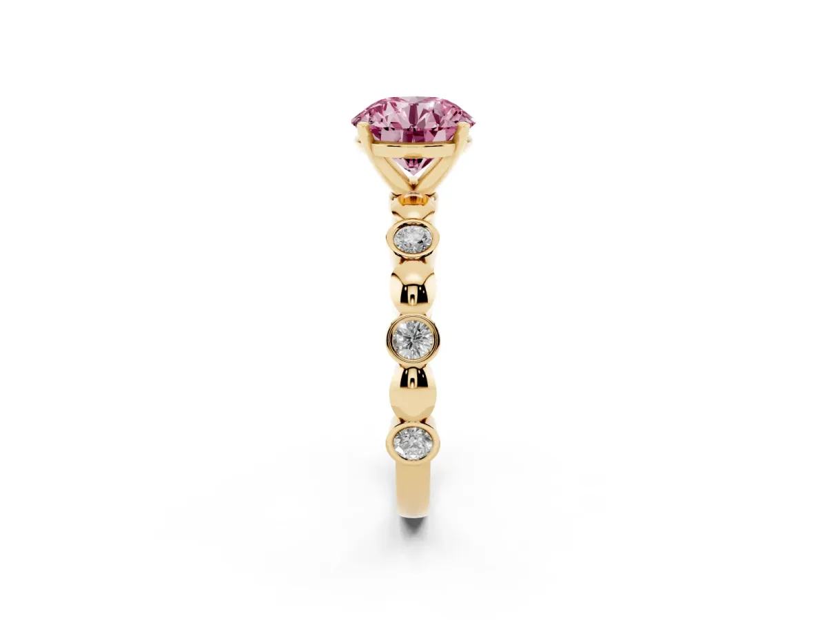 Fancy Pink Round Cut Solitaire Bezel-Set Diamond Ring with Beaded Band and Four-Prong Setting Yellow gold