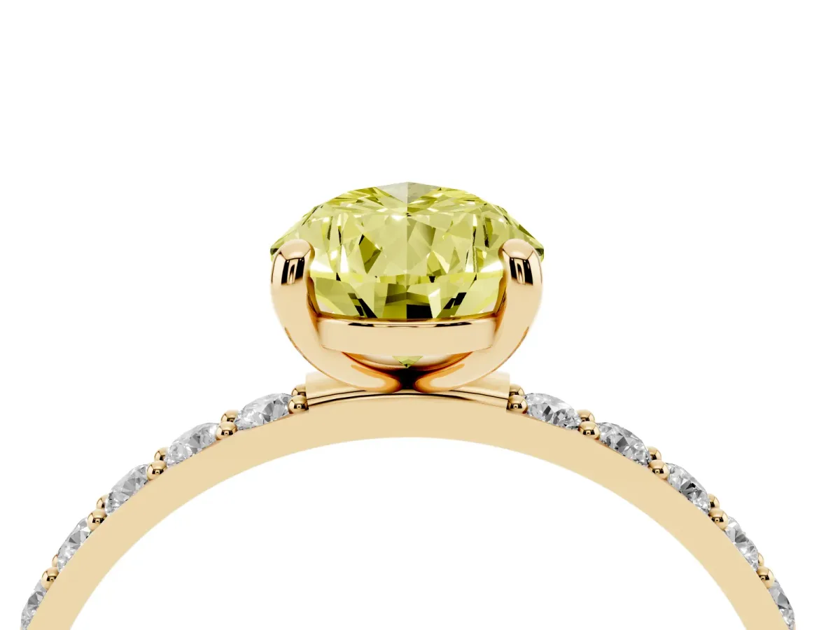 Fancy Yellow Pear Cut Diamond Solitaire Ring with Round Pavé Band and Prong Setting Yellow gold